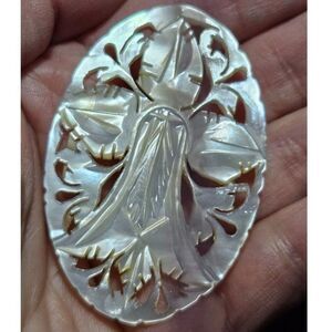 Vintage mother of pearl carved brooch
